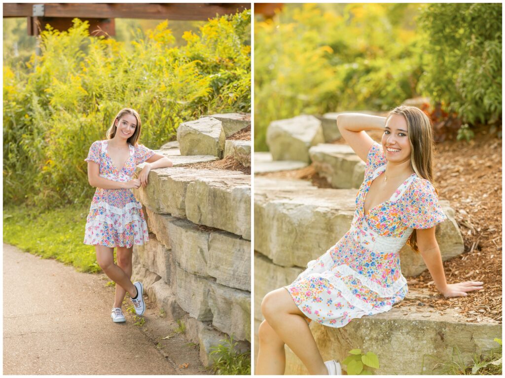 Two side-by-side images of a woman in a floral dress. Left: She leans against a stone wall, smiling, in a sunny park. Right: She sits on the wall, relaxed and cheerful.