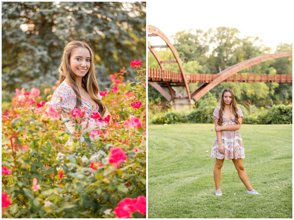 A young woman in a floral dress poses among vibrant pink flowers, smiling warmly. Nearby, she stands confidently on grass with a wooden bridge in the background.
